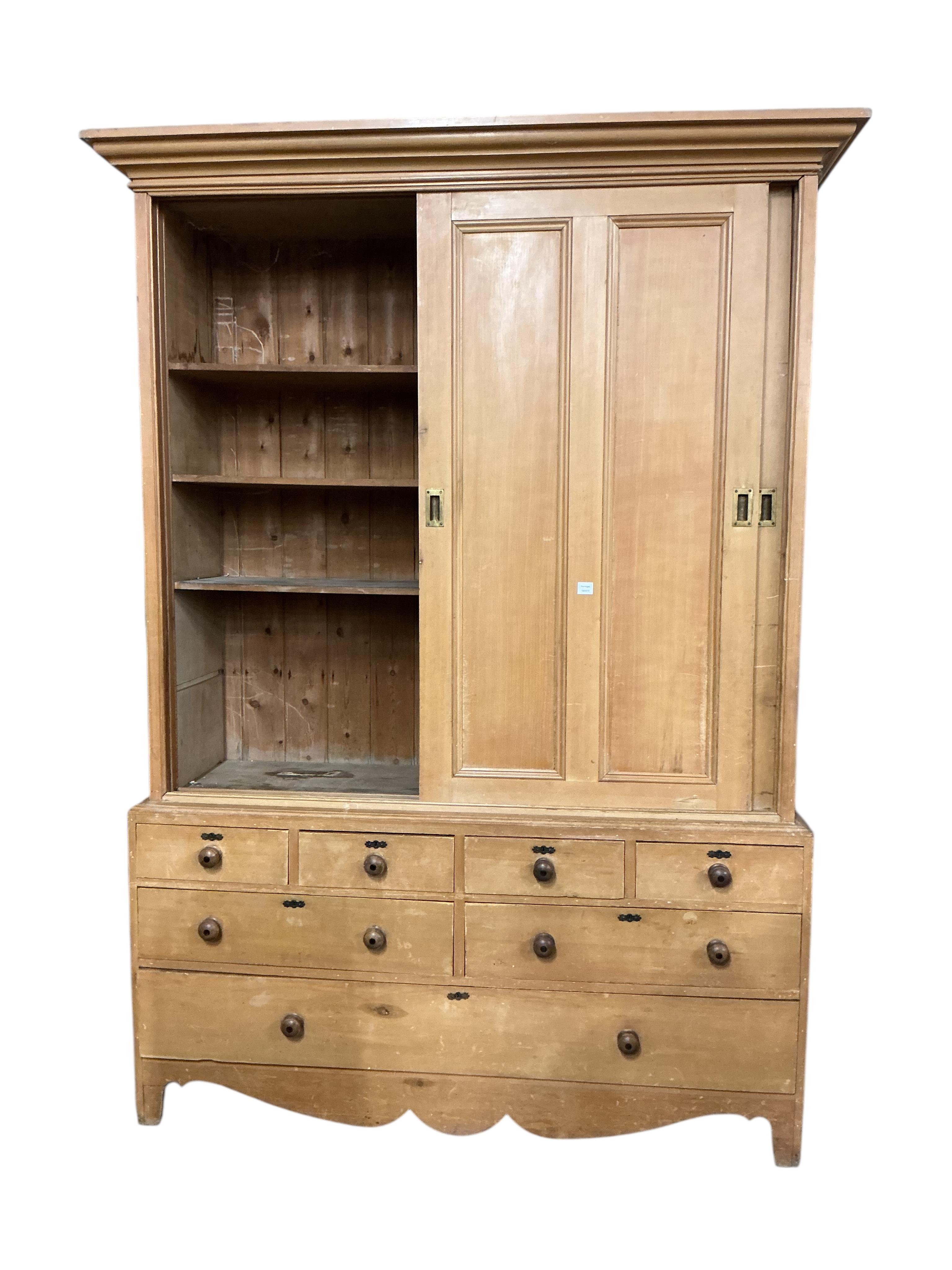 A 19th century pine household cupboard, width 183cm, depth 60cm, height 270cm